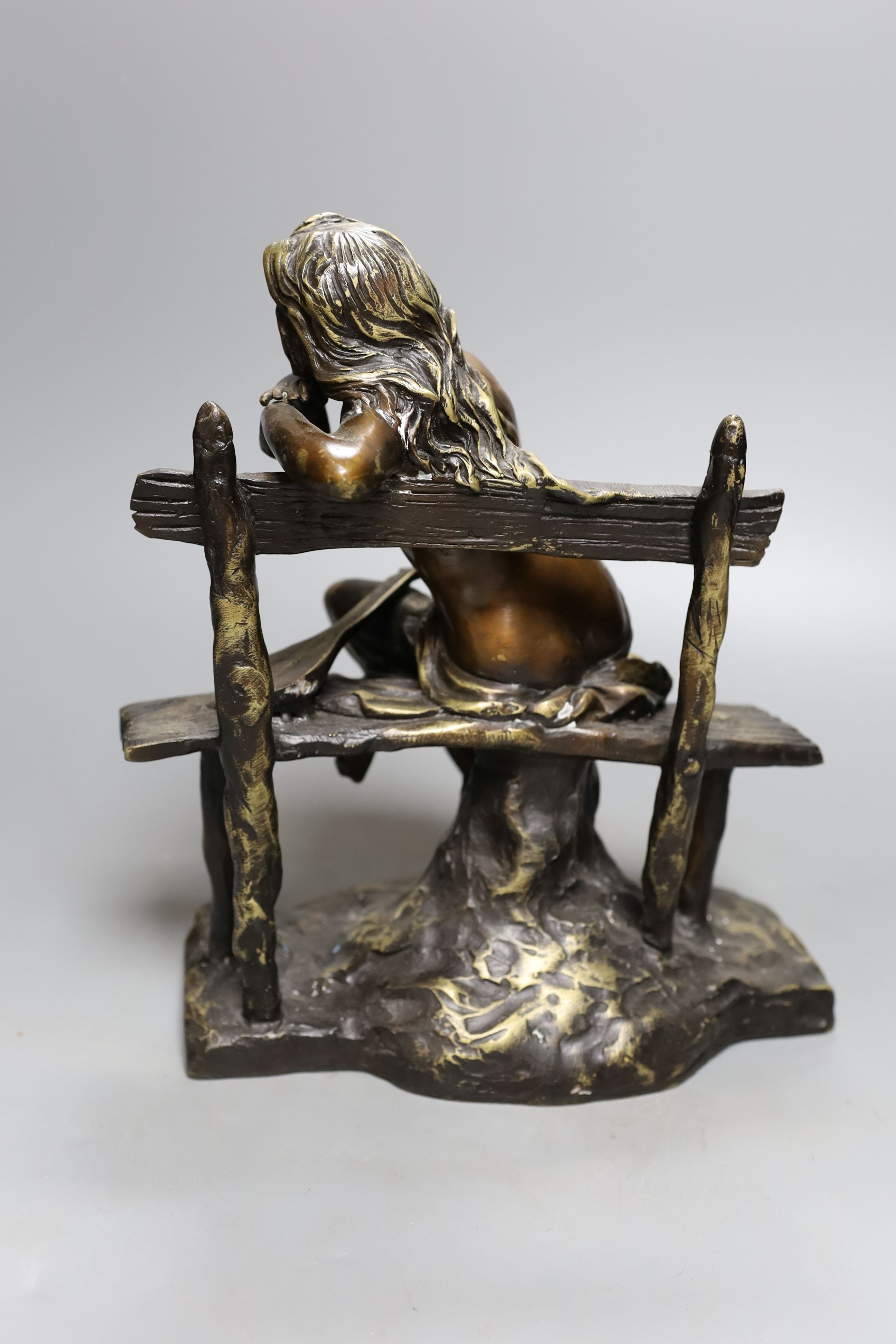 A bronze female, seated with lute, 27cm.